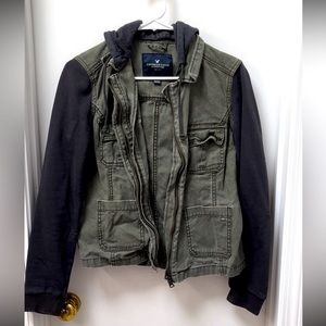 Cute jacket with sweater-material sleeves and hood